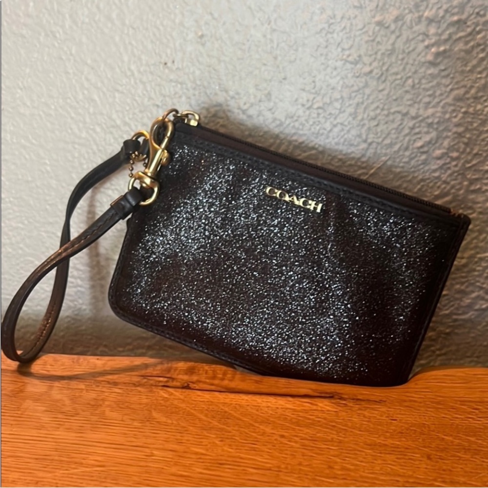 Coach Black Leather Tag with Gold Accents